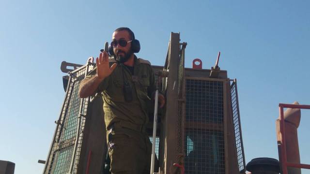 Israeli military bulldozer operator. Photo: Guy Hirchfeld, Ta'ayush